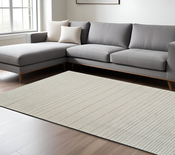 8' X 11' Cream and Beige Abstract Non Skid Area Rug